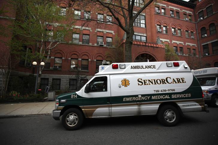 An ambulance pulls up outside of the Cobble Hill Health Center on April 18, 2020 in the Cobble Hill neighborhood of Brooklyn.